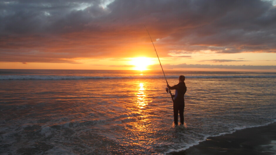 Xiaoli (hostess) catching our dinner on Ninety Mile Beach