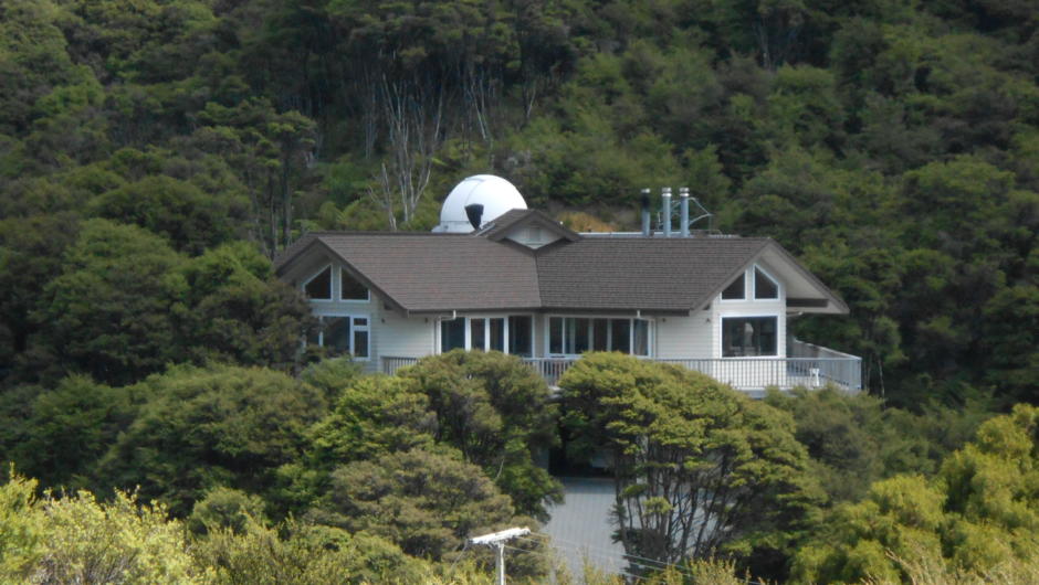 OBSERVATORY LODGE WITH TELESCOPE DOME BEHIND