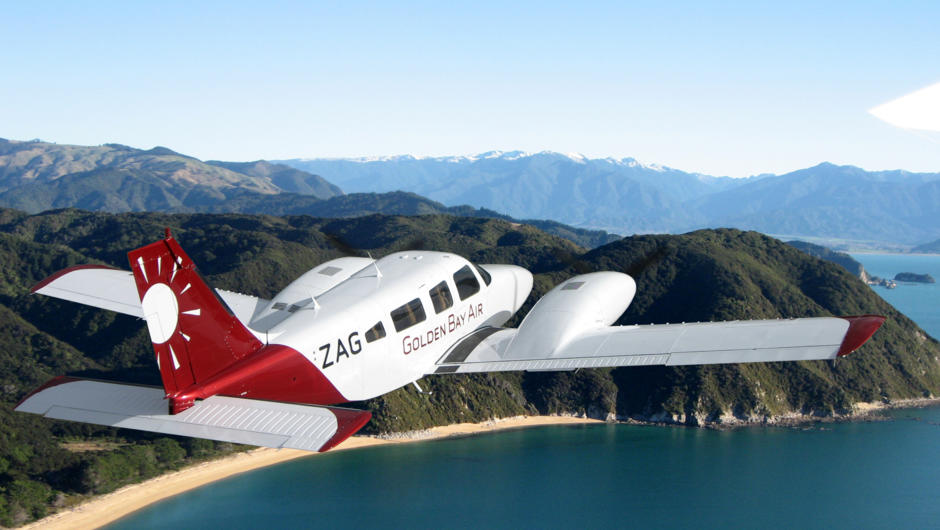 Golden Bay Air passing Abel Tasman National Park on its scheduled flight between Wellington and Takaka