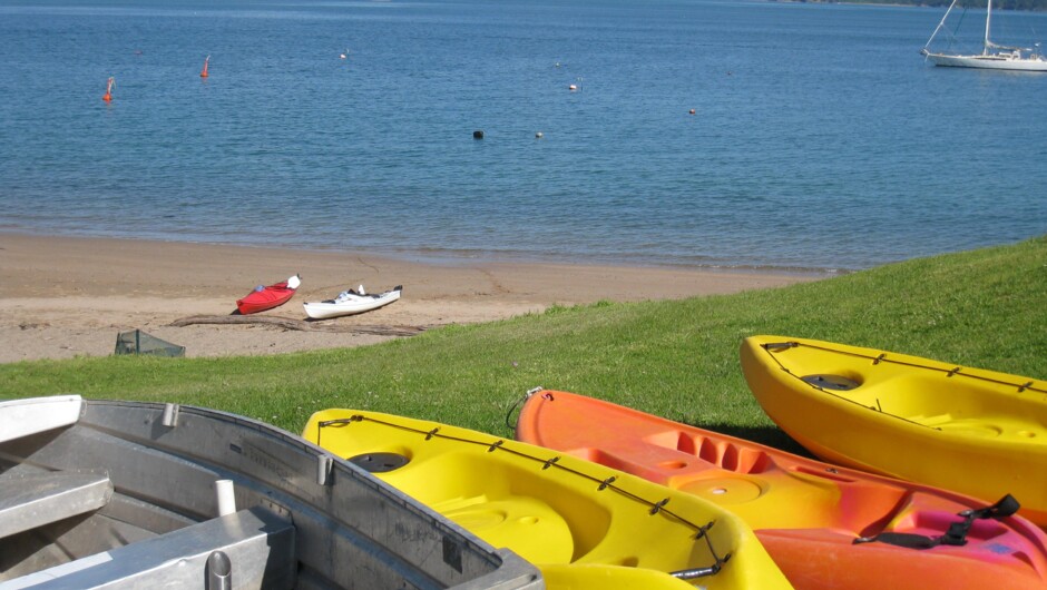 Three kayaks and dinghy for guest use