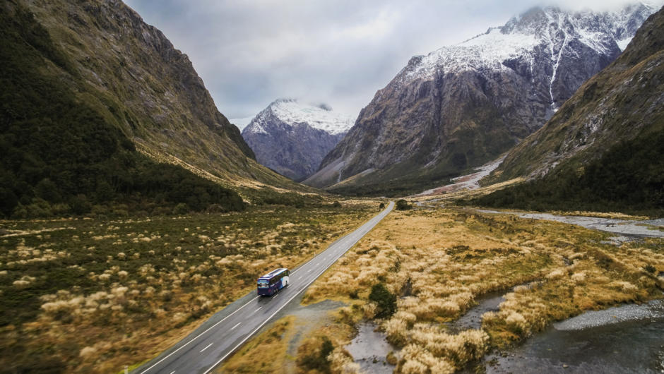 Enjoy the scenery on the road to Milford Sound on New Zealand&#039;s luxury coach tour