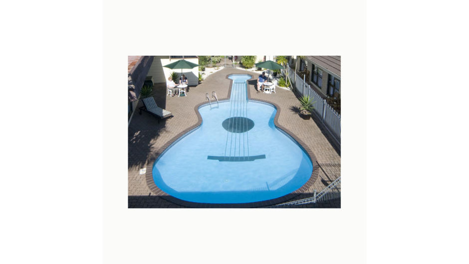 Guitar-shaped swimming pool