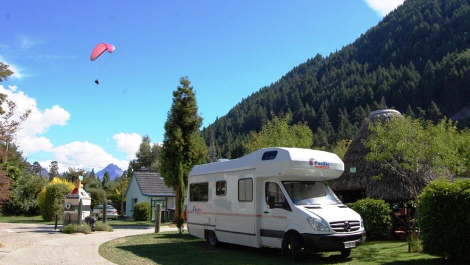 View of paragliders from campervan sites