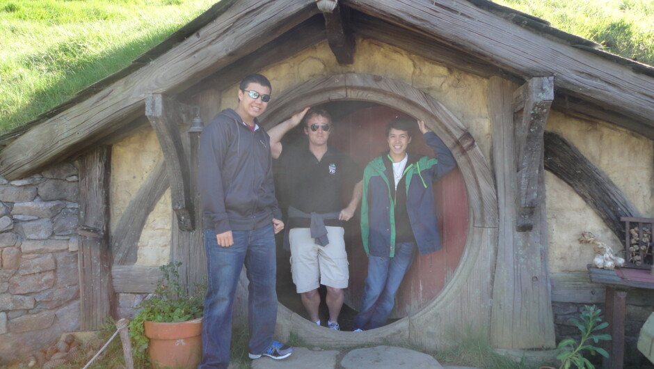 Posing at Hobbiton with the group