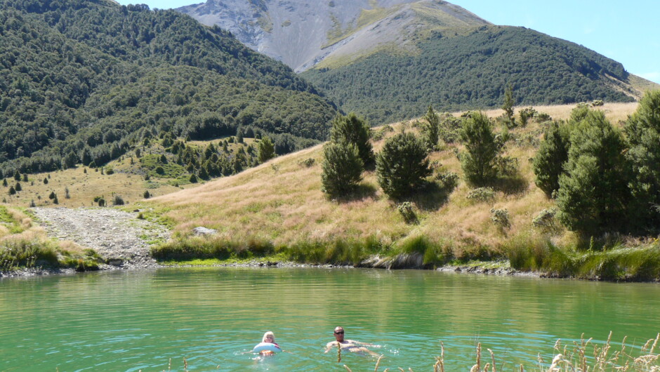 swimming in a crystal clear mountain lake
