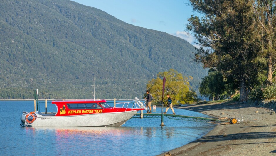 Kepler Water Taxi departing from Te Anau lakefront to Brod Bay, Kepler Track