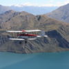 View Wanaka by air in a vintage aircraft.