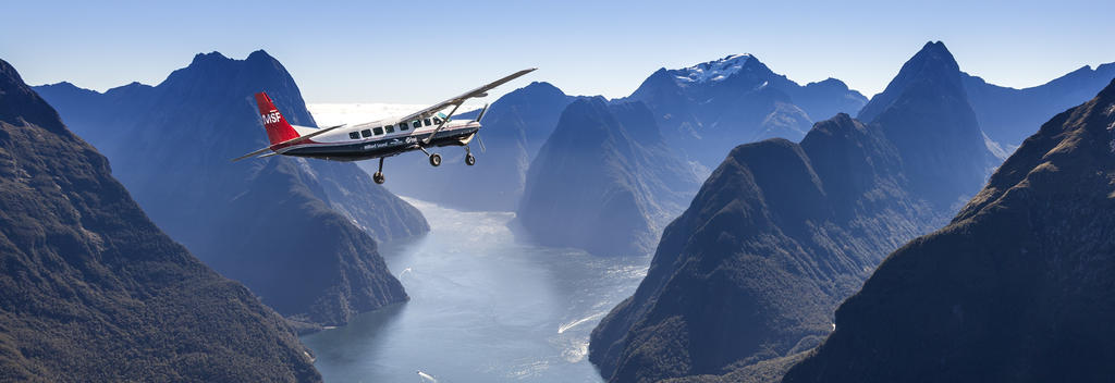 Take a scenic flight over the Southern Alps to Milford Sound and across Fiordland.