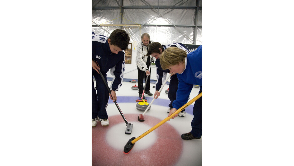 Young curlers learning the art at Maniototo Curling International, in Naseby, Central Otago