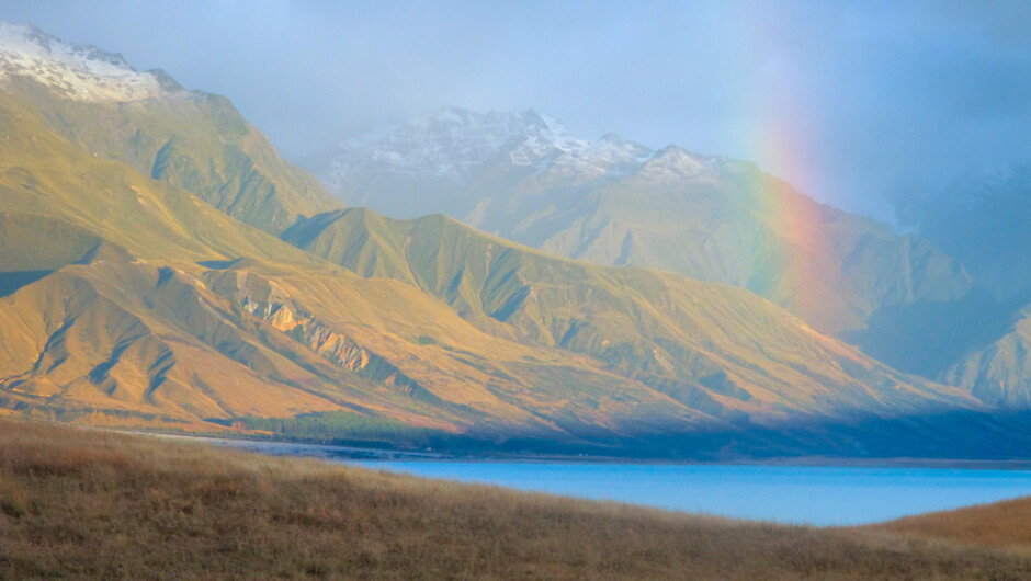 Rainbow over cobalt blue waters