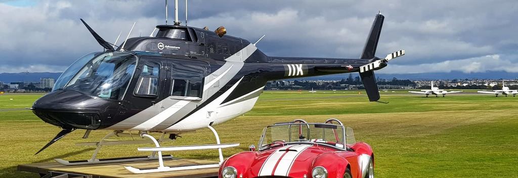Bell Jet Ranger helicopter and AC Cobra