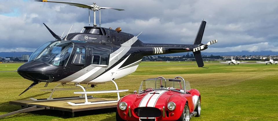 Bell Jet Ranger helicopter and AC Cobra