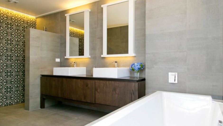 Sleek en-suite with spa bath