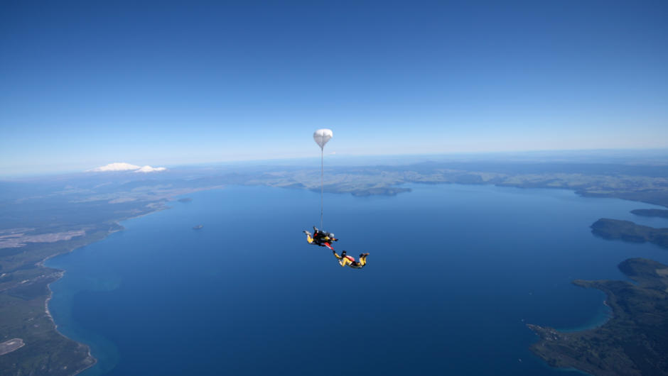 Freefall above Lake Taupo and take in views of snowy volcanoes, the shores of lake, and geothermal activity.