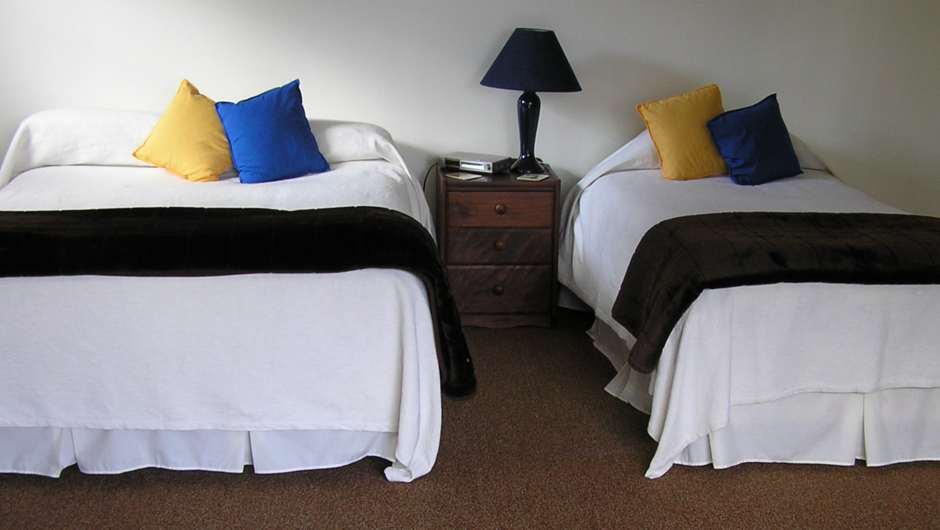 Studio Cottage bedding configuration (1 Queen Bed and 1 Single Bed)