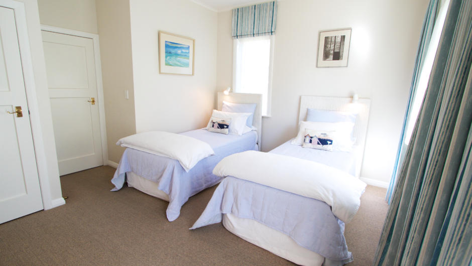 Accommodates 4 people - second bedroom has 2 single beds (or King bed option).