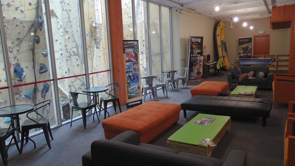 Guest lounge with veiw of climbing wall