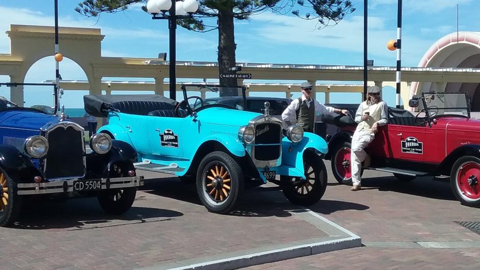 The open top vintage cars on Marine Parade on a sunny day in Napier.