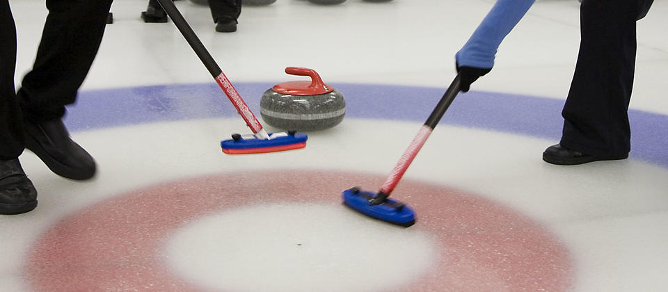 Sweeping the ice helps to speed up and smooth the ice for the curling stone.