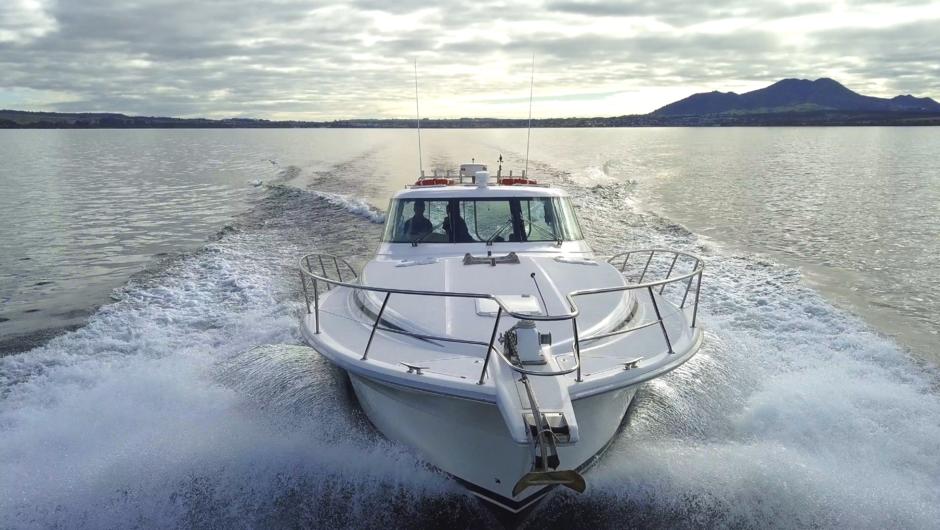 Hire a private fishing charter on Lake Taupo with Chris Jolly Outdoors.