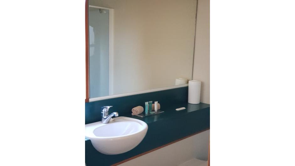 Good size modern bathrooms with new showers, Toiletries included