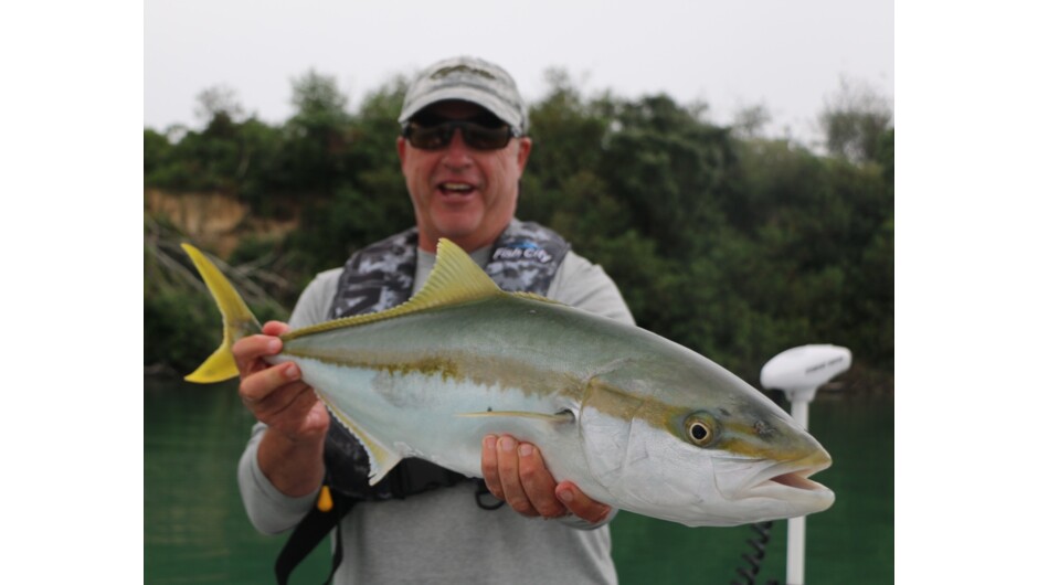 Happy client and kingfish ready for release.