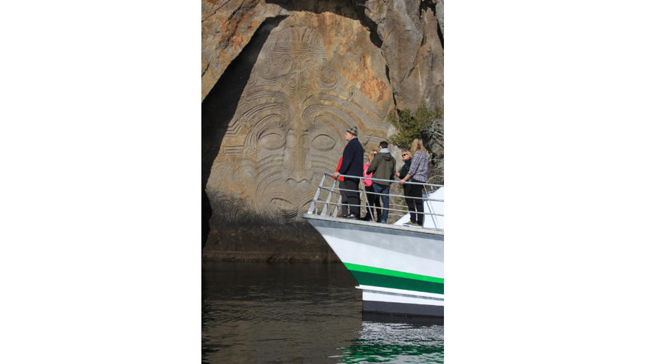Maori Rock Carvings are a highlight on a Chris Jolly Outdoors scenic cruise