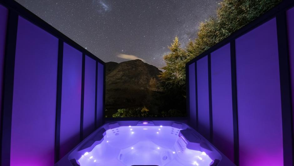 Private outdoor hot tub at night
