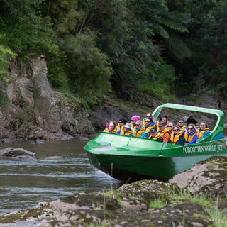 Enjoying the Whanganui River in the comfort of the Forgotten World Jet Boat