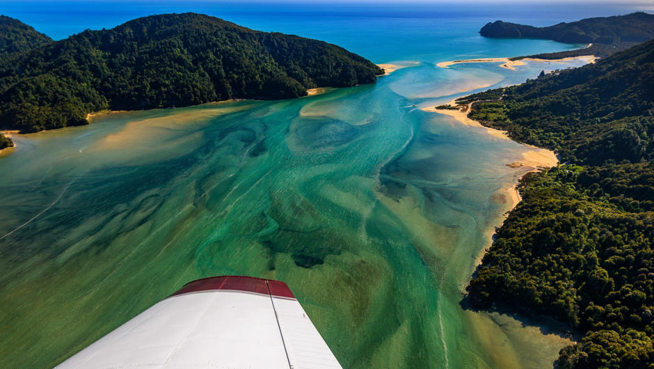 The azure waters of Abel Tasman on a Golden Bay Air scenic flight