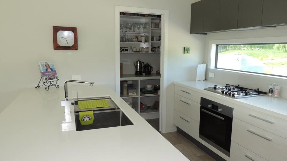 A full working kitchen including butlers pantry fridge and dishwasher