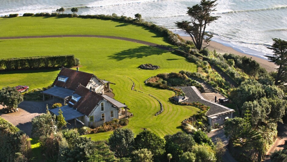 Set in farmland with magnificent sea views