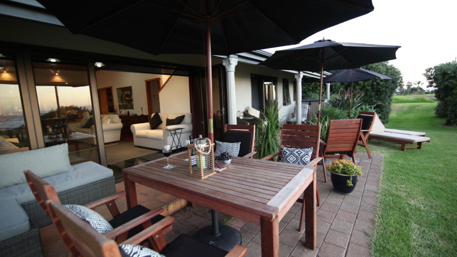 Relax on the front deck/patio overlooking the sea view