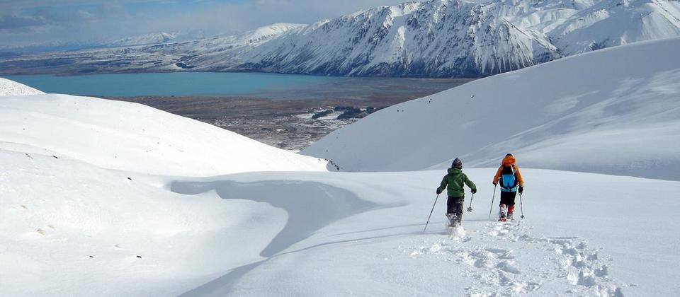 Snowshoeing high above Lake Tekapo in the foothills of the Southern Alps.