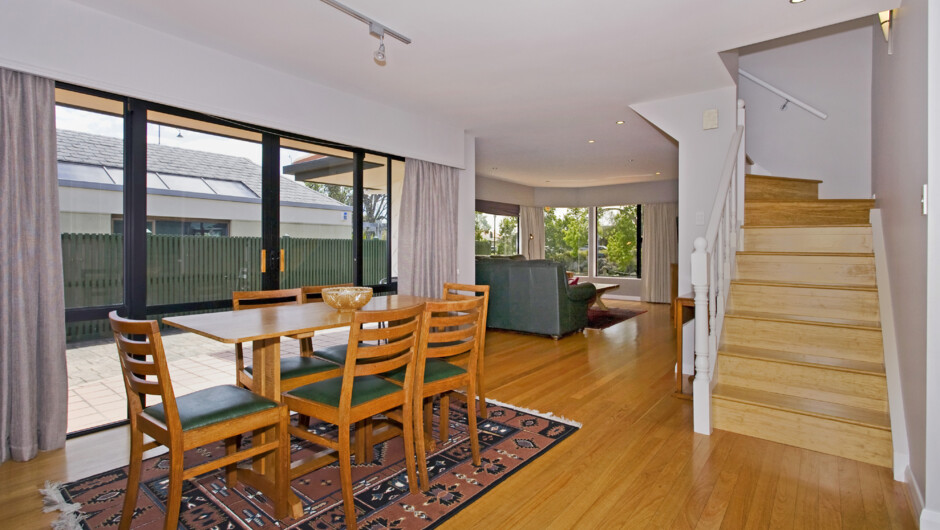 Dining area and stairs taking you to bedroom 4