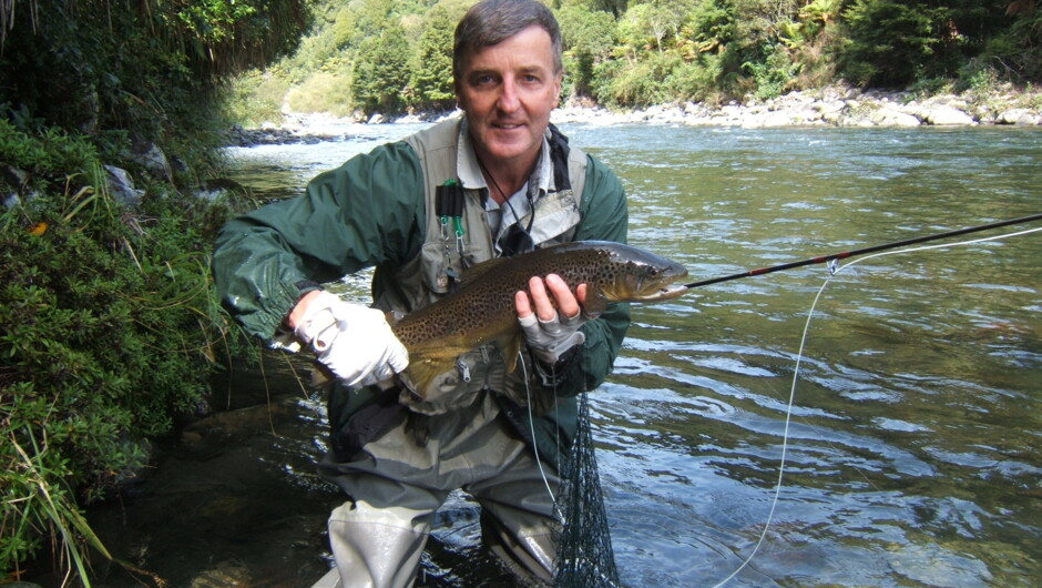 Happy client with a beautiful Brown Trout