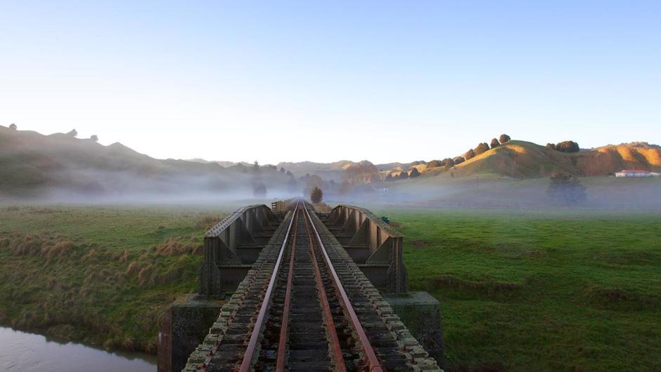 An ethereal mist shrouds the rail way tracks leading into the Forgotten World.