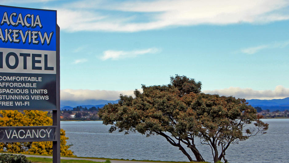 View of Lake Taupo and our Motel sign.
