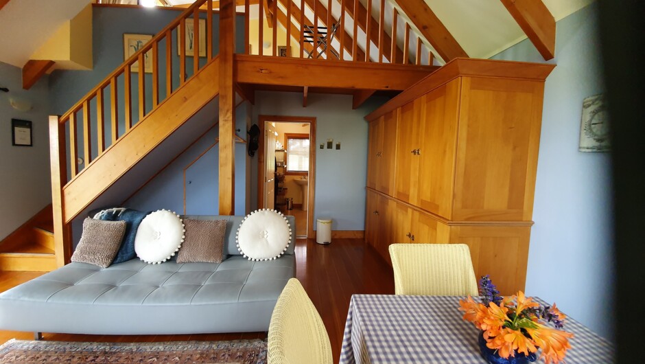 Downstairs lounge, kitchenette &amp; bathroom - Kamahi Cottage