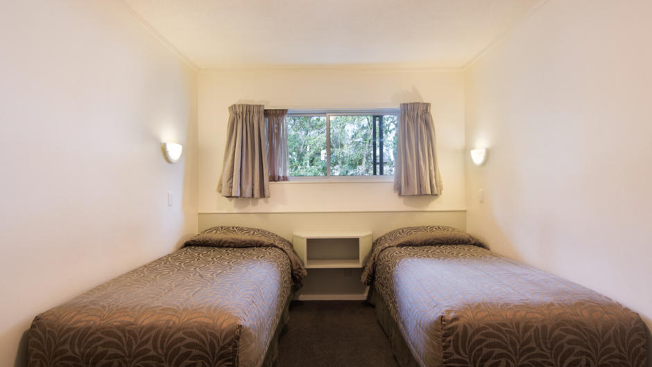 Two bedroom units have one bedroom with a 
Queen Bed & second bedroom with 2 Single Beds.