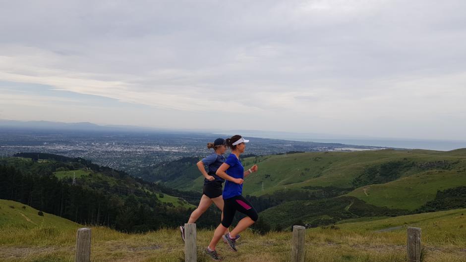 On the trails of the port hills with the city in the background