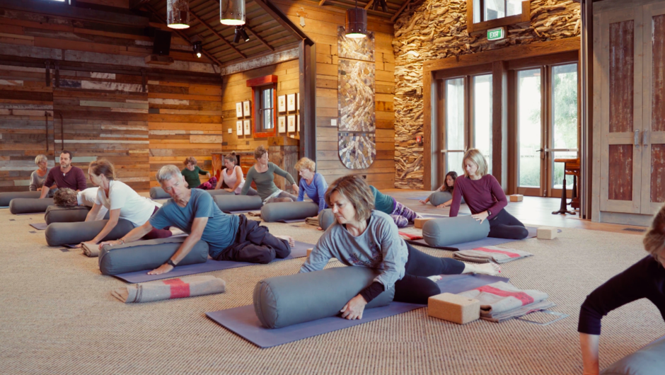 Guests on a yoga class at Camp Glenorchy's Homestead Building