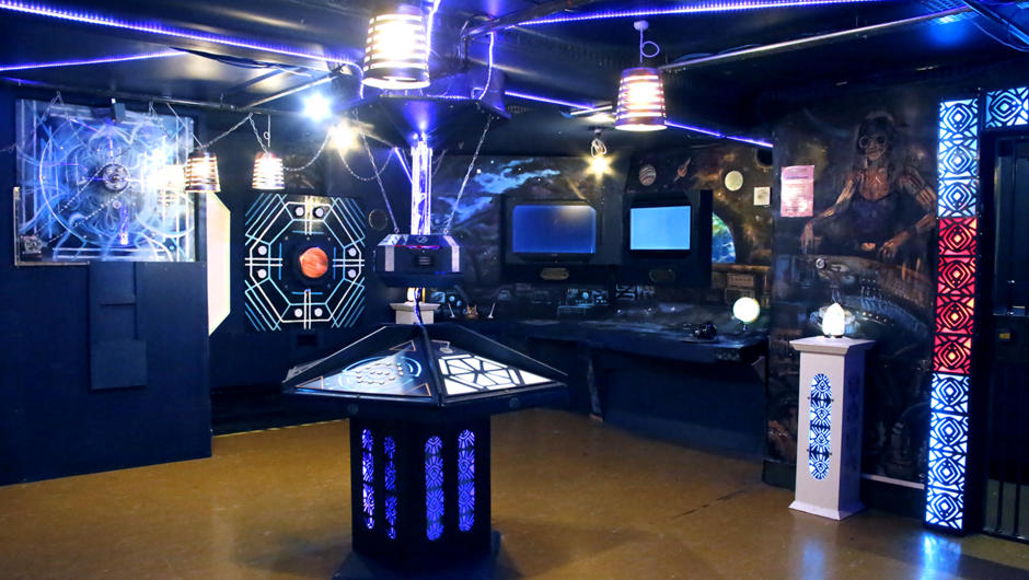 The Spaceship escape room is very SPACEous and loaded with seriously cool, tactile puzzles, many hidden rooms and secret compartments - there is more than meets the eye! 
Suitable for all teams of 4-16 players, kids welcome from 8 years of age. 
Embark 