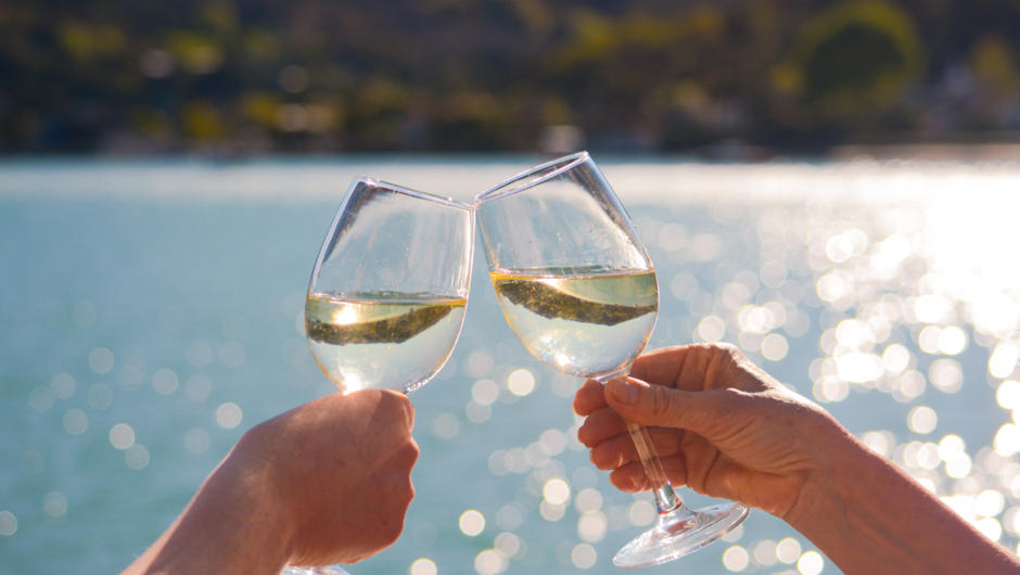 While onboard enjoy a complimentary glass of New Zealand award-winning wine - Astrolabe Sauvignon Blanc. We also offer New Zealand beer and non-alcoholic options.