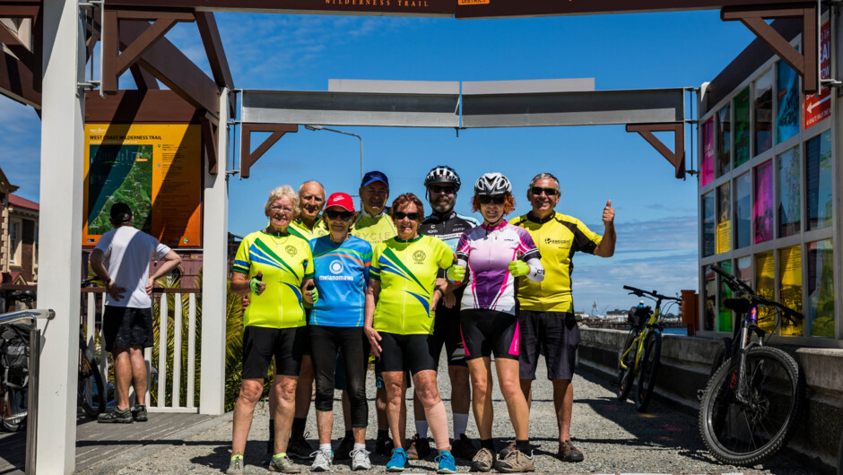 Celebrating the end of our ride in Greymouth