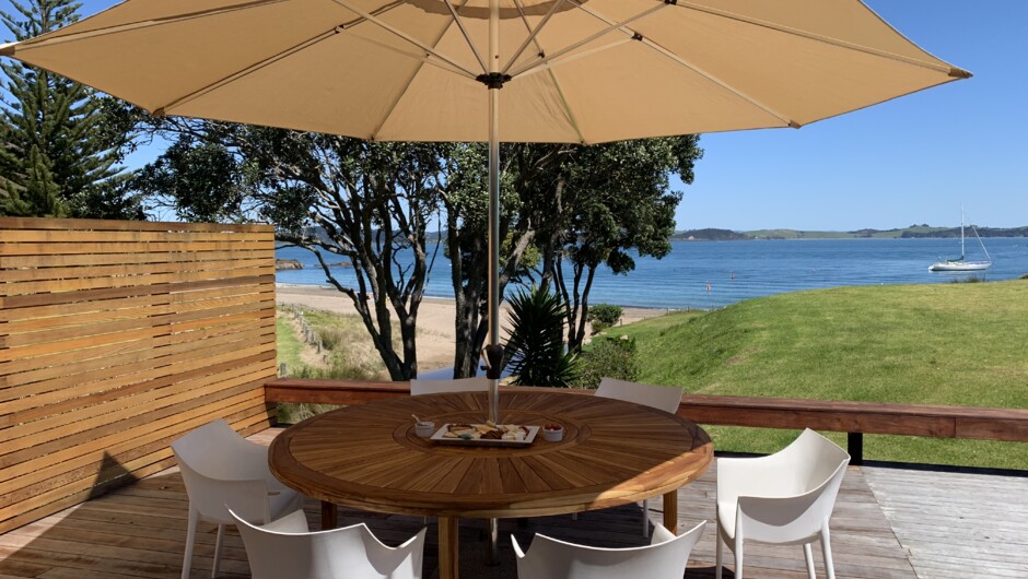 Outdoor dining with million dollar views, loungers and BBQ