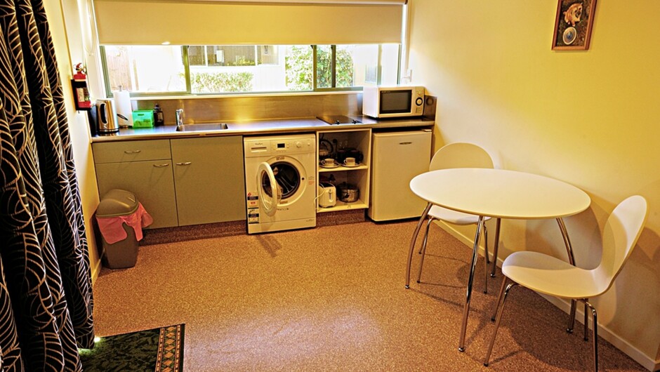 Kitchen with washing machine.