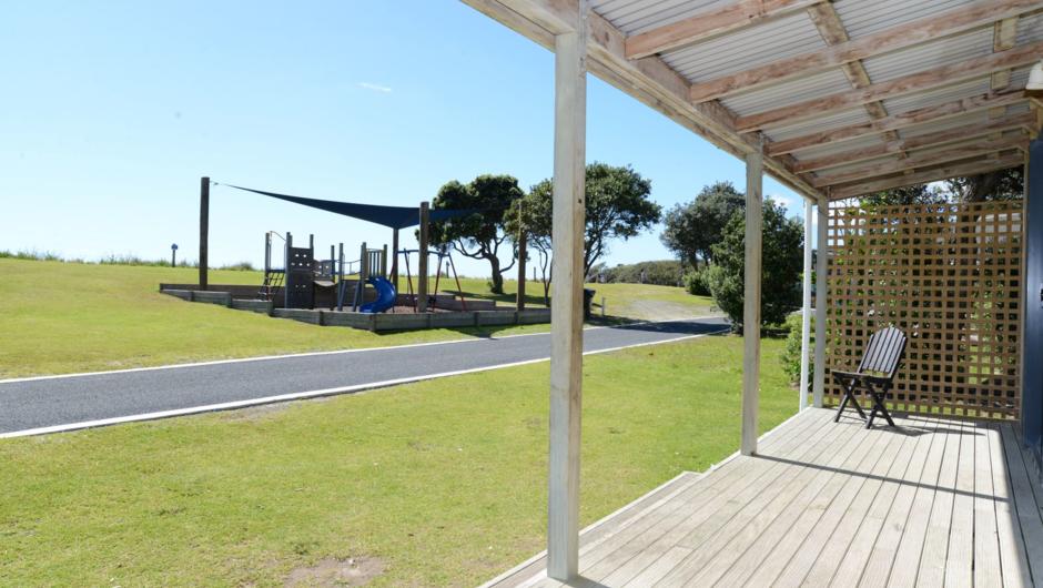 View from a front deck area of one bedroom self-contained cabin, short walk to the beach.