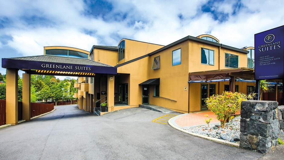 Green Leafy Exterior of Property with parking