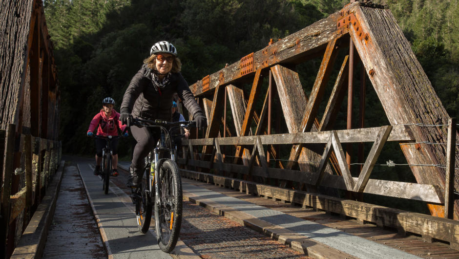 Riding the truss bridge on Remutaka Cycle Trail